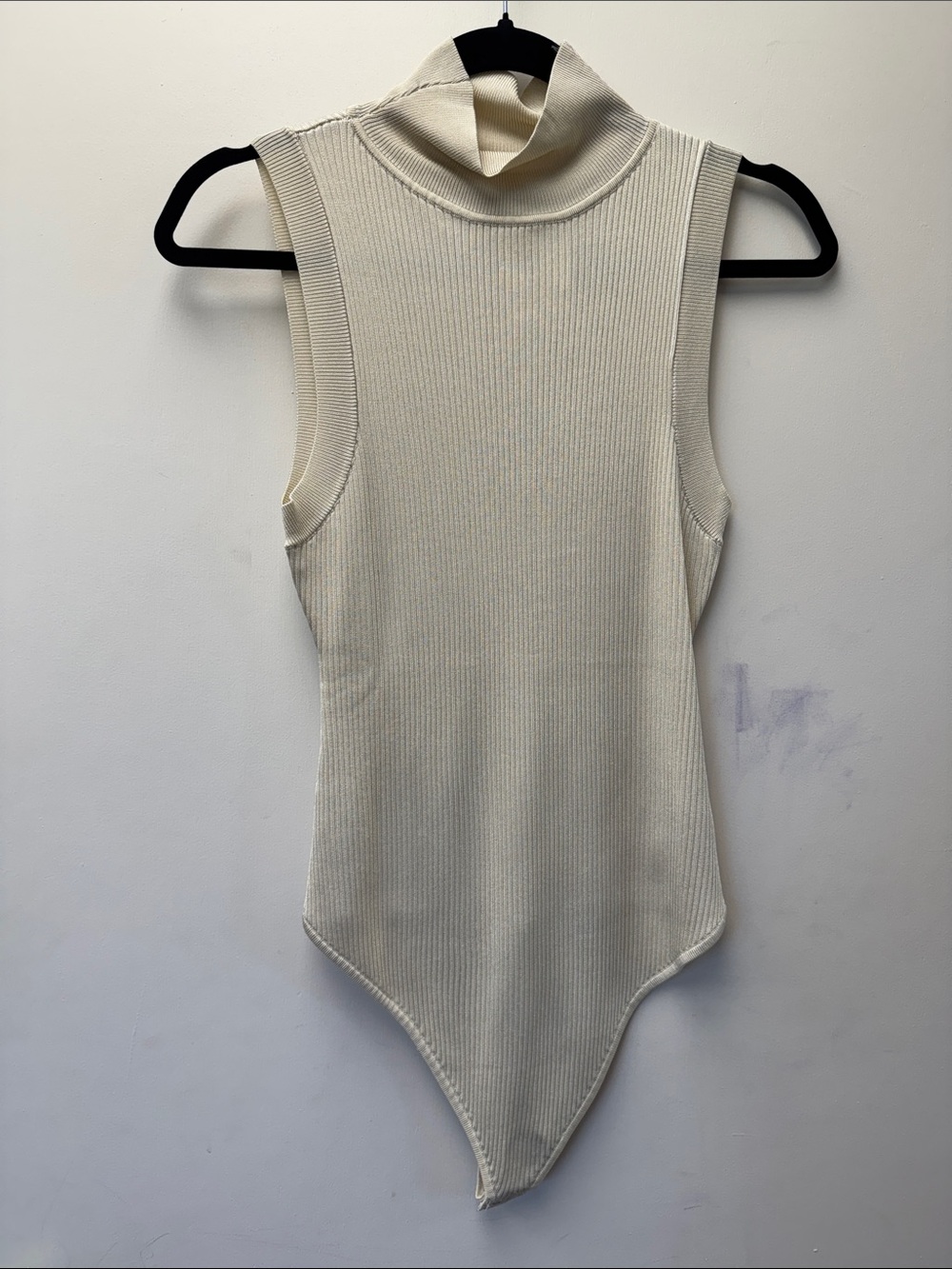 Good American Sleeveless Ribbed Turtleneck Bodysuit in Cream